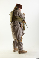  Photos Luis Donovan Army Taliban Gunner Poses charging gun standing whole body 0006.jpg